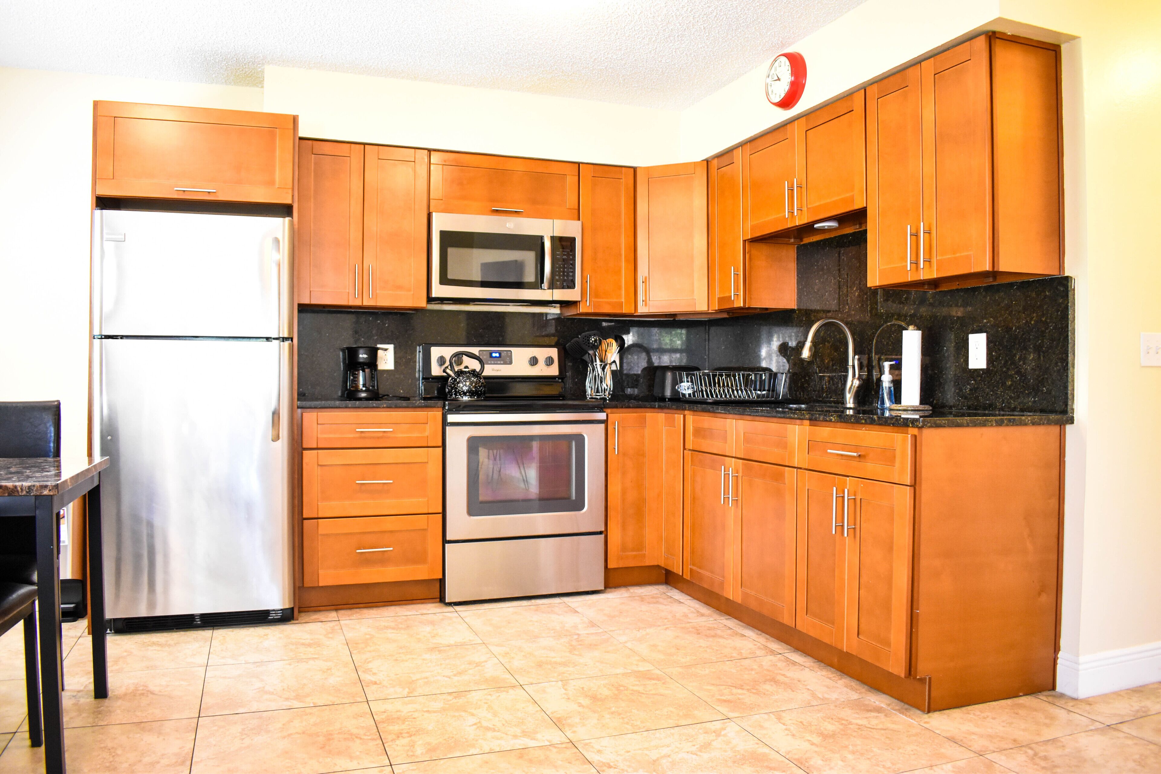 Coffee/tea maker, fridge, microwave, oven