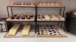 A bakery display with various baked goods and pastries. - Ji Hotel Shanghai The Bund Town City God Templ (Shanghai)