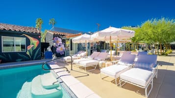 Outdoor pool, free pool cabanas, pool umbrellas