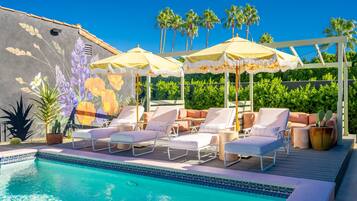 Outdoor pool, free cabanas, pool umbrellas