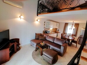 Apartment, 1 King-Bett und Schlafsofa | Wohnzimmer