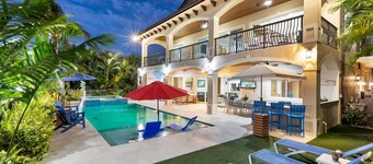 5 bedrooms, pool/spa heated, bikes, kayaks, game room, elevator, deep 75' dock.