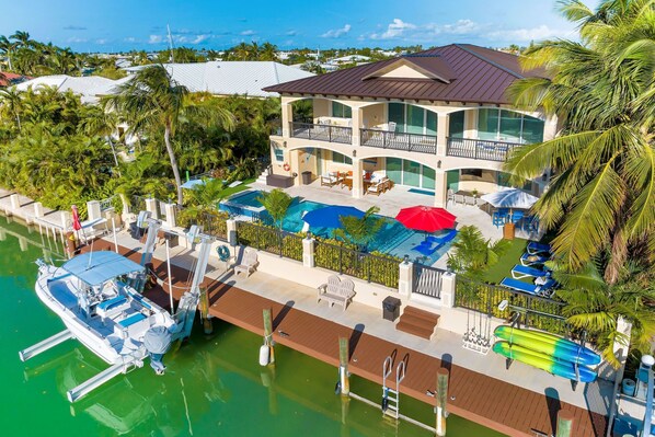 Exterior - Elev • 5BR/8BA • Game Room • 75’ Deep Canal Dock • Ice Maker • Kayaks • Bikes (Key Colony Beach)