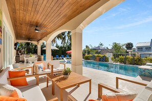 Outdoor dining - Elev • 5BR/8BA • Game Room • 75’ Deep Canal Dock • Ice Maker • Kayaks • Bikes (Key Colony Beach)