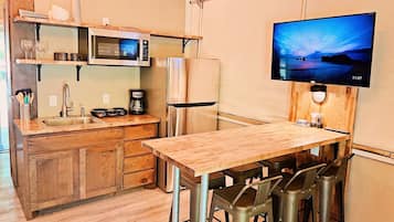 Fridge, microwave, stovetop, coffee/tea maker