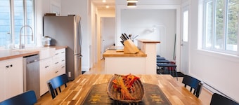 Modern style home with spectacular views of the Margaree River.