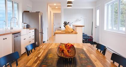 Modern style home with spectacular views of the Margaree River.