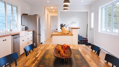 Modern style home with spectacular views of the Margaree River.
