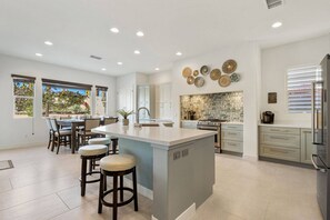 Fridge, microwave, oven, stovetop - Beautiful Palm Desert Retreat | Amazing Backyard with Pool, Swim-up Bar, Waterfall & Hot Tub (Palm Desert)