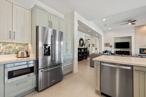 Fridge, microwave, oven, stovetop - Beautiful Palm Desert Retreat | Amazing Backyard with Pool, Swim-up Bar, Waterfall & Hot Tub (Palm Desert)