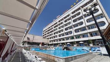Seasonal outdoor pool, open 10:00 AM to 9:30 PM, free cabanas