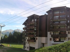 Enjoy breathtaking views of the surrounding mountains and trees from the balconies of this mountain retreat.