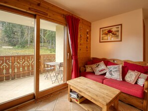 Relax on the balcony with a view, or unwind on the sofa with a framed picture above.
