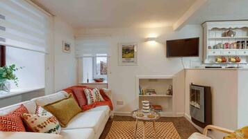 Apartment, Mehrere Betten | Wohnzimmer