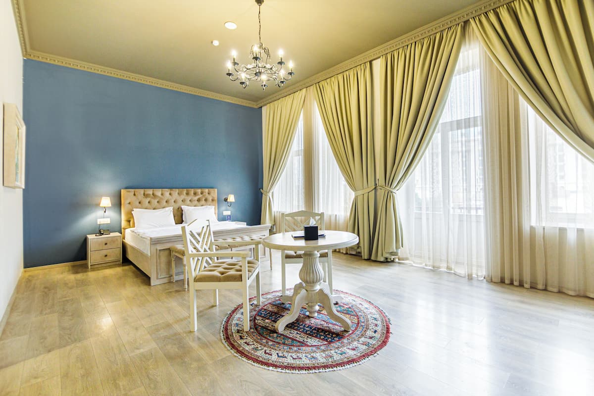 Suite Junior, balcon | Literie de qualité supérieure, minibar, décoration personnalisée