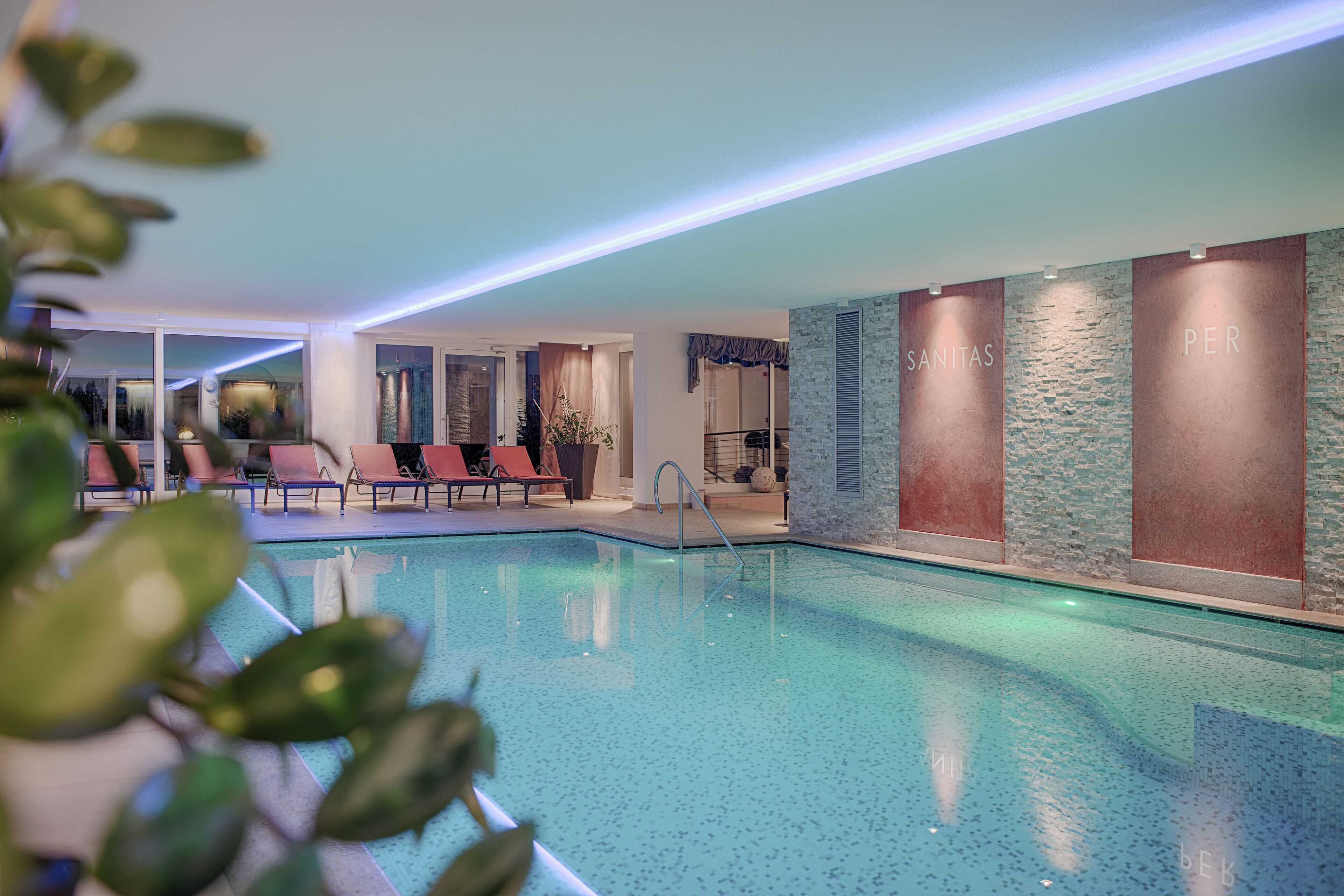 Indoor pool, pool umbrellas, sun loungers