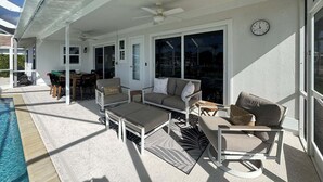 Outdoor dining - Waterfront 3BR/2BA Marco Island home with heated pool and Wi-Fi. (Marco Island)