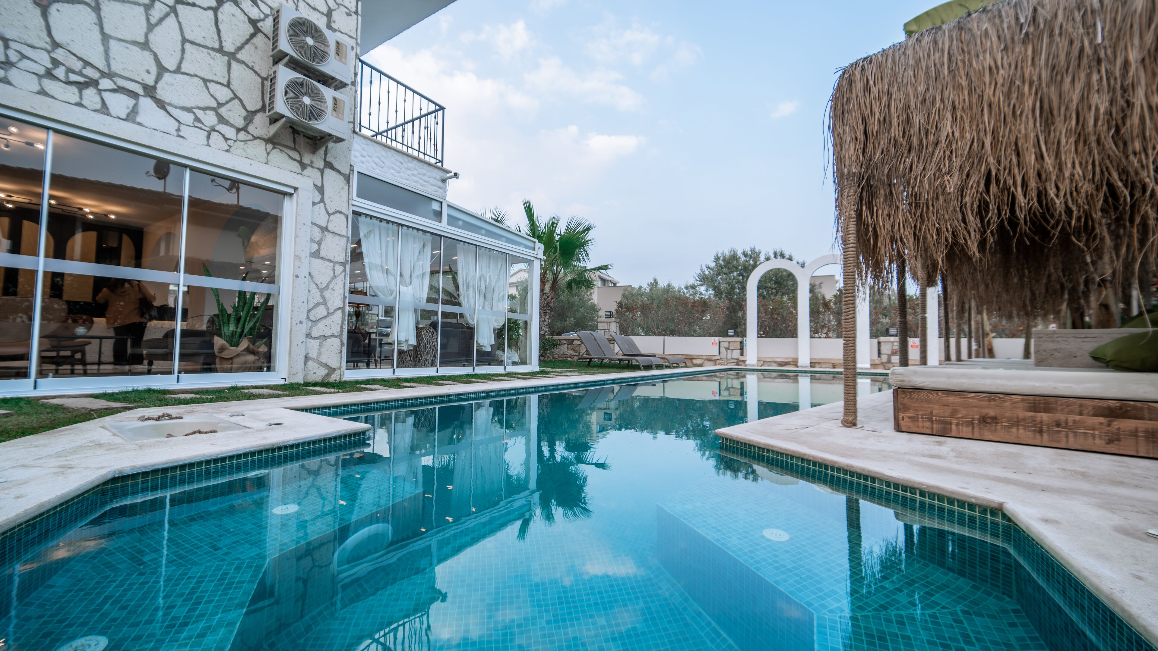 Outdoor pool, pool umbrellas, pool loungers