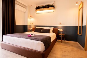 家庭房 | 迷你吧、客房内保险箱、遮光窗帘、隔音