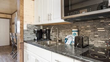 Fridge, microwave, stovetop, coffee/tea maker