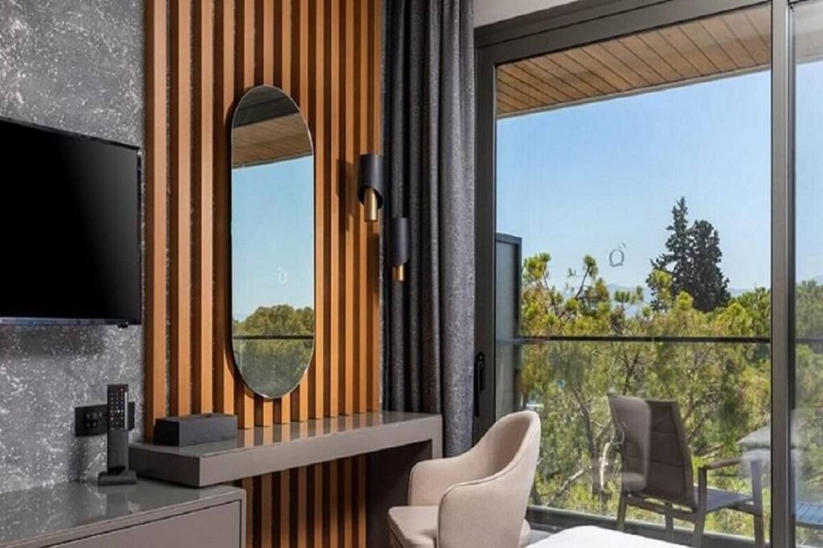 Sengetøy av topp kvalitet, senger med Select Comfort-madrass og minibar