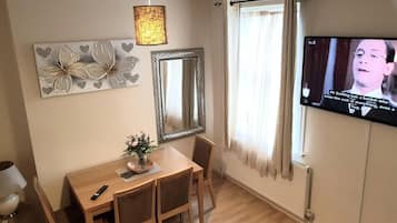 House | Living area | 30-inch TV with cable channels