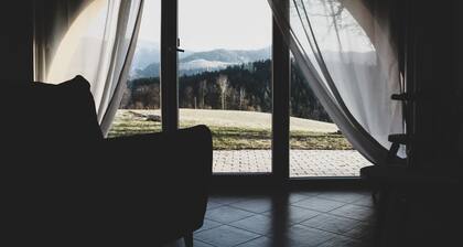Apartment with private garden and mountain view