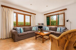TV, fireplace, DVD player, books - Villa Binimelis - Five Bedroom Villa, Sleeps 10 (Cala d'Or)