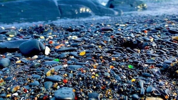 A close-up of a pebble beach with variously colored stones and shells. - Fishy-Fishy Townhome, 2BR/2BA (Kenai)