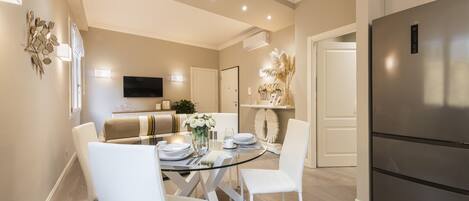 Deluxe Apartment, 1 Bedroom | Living area | Flat-screen TV