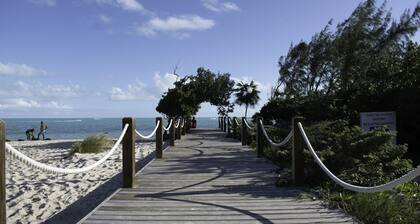 A Kiteboarders Dream complete with a Pickle Ball Court and a Pool!!