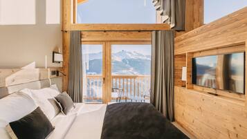 Executive suite | Luxe beddengoed, bedden met traagschuimmatrassen, een minibar