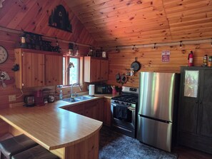 Fridge, microwave, oven, stovetop - Cabin on a private lake near ATV trails (Danbury)