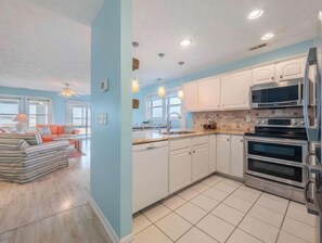 Enjoy cooking in this well-equipped kitchen with a double oven and microwave.