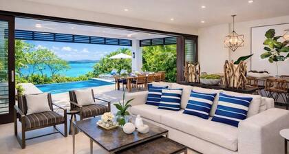 EXCLUSIVE 4BR DESIGNER WATERFRONT VILLA CHEF POOL BEACH ACCESS PICKLEBALL GYM