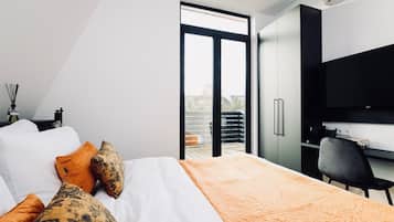 Luxe beddengoed, pillowtop-bedden, een kluis op de kamer