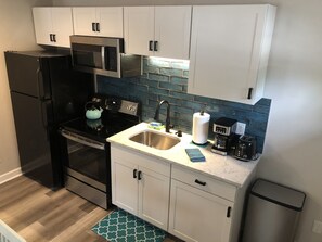 Refrigerador, microondas, horno, placa de cocina