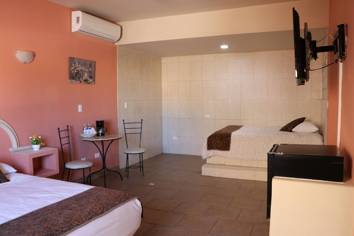 Down comforters, minibar, in-room safe, iron/ironing board