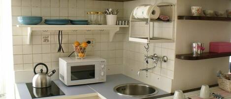 Fridge, microwave, coffee/tea maker, dining tables