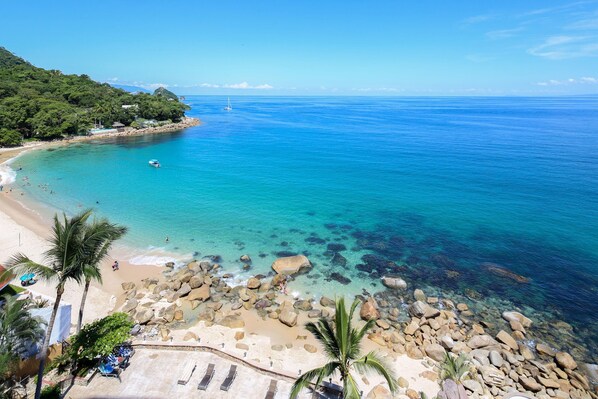 On the beach, sun loungers, beach towels