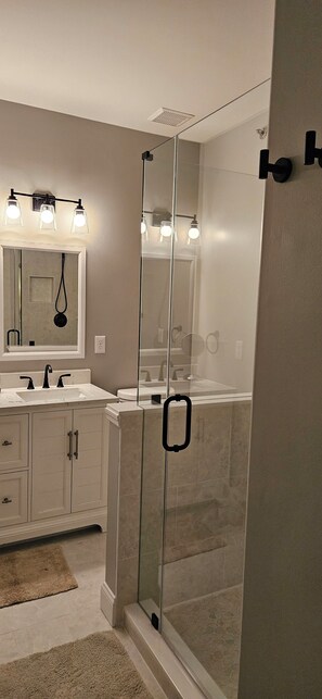 Bathtub, towels, toilet paper