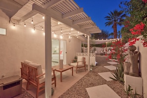 Relax in our outdoor patio area, complete with comfortable seating and a beautiful pergola.
