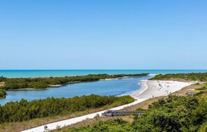 On the beach, sun loungers, beach towels