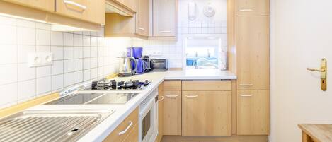 Fridge, microwave, dishwasher, coffee/tea maker