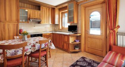 Maison de vacances Baita sulle Alpi, vue montagnes, jardin, terrasse, barbecue et Wi-Fi.