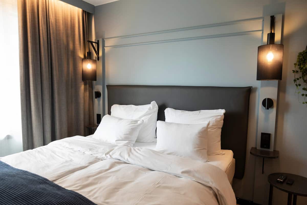 Family Room | Premium bedding, down comforters, memory foam beds, desk