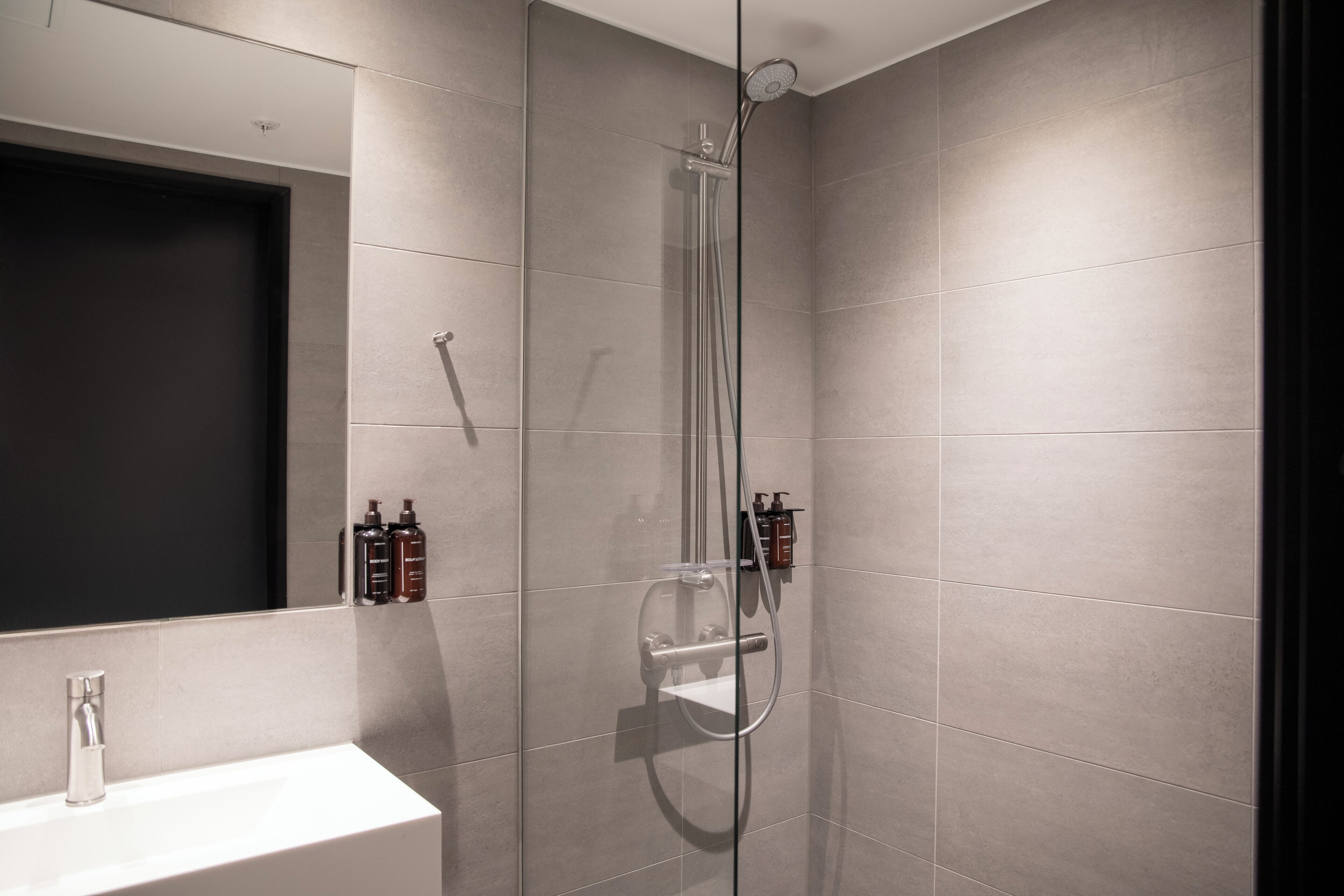 shower, hair dryer, heated floors, towels