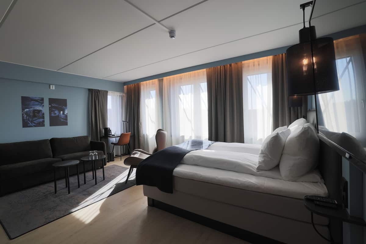 deluxe double room | premium bedding, down duvets, memory-foam beds, desk