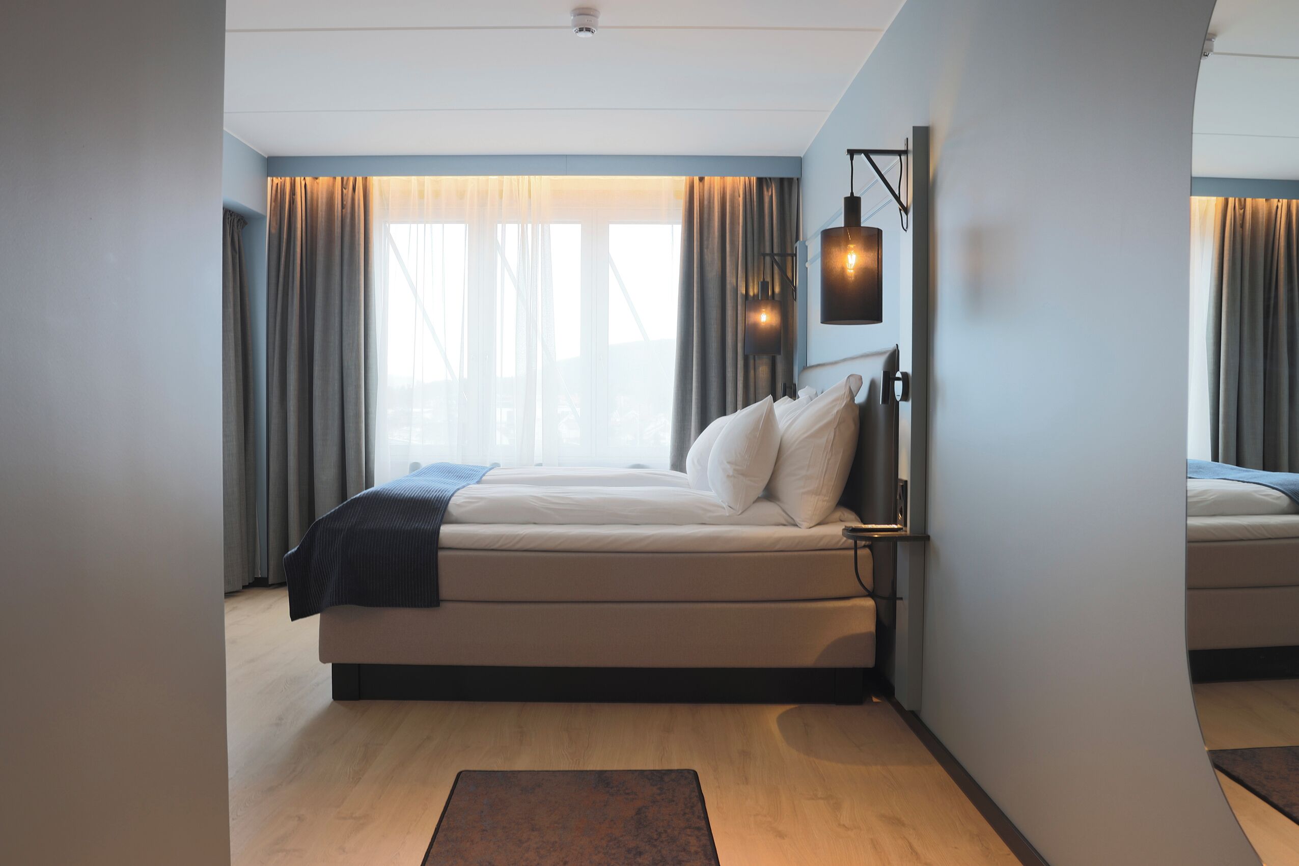 superior double room | premium bedding, down duvets, memory-foam beds, desk