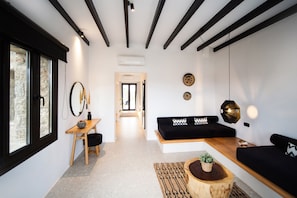 Deluxe Suite with Private Pool | Living area | 32-inch plasma TV with cable channels, TV - Agrari Bo Suites (Mykonos)